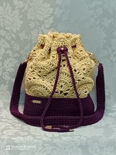 Borse donna lavorate a